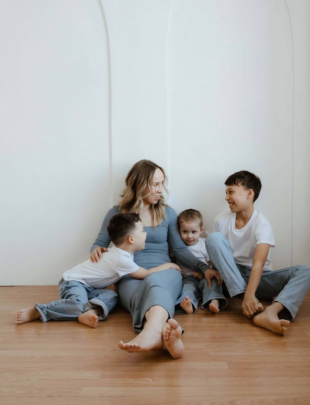 Kieran sitting with with her three boys